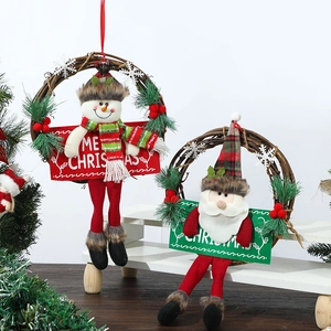 Christmas snowman and Santa plush wreaths with Merry Christmas sign on white background