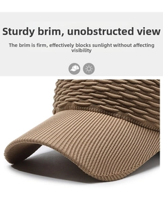 Close-up of brown sun visor showing detailed knit texture and vertical ribbed brim