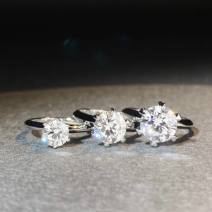 Classic 1ct D-color moissanite rings in six-prong sterling silver setting comparison