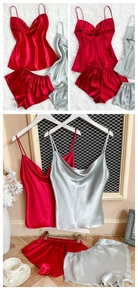 Detail of silk satin pajamas set with cowl neck design in red and silver gray colors