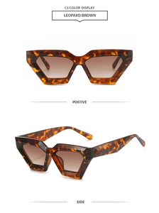 Detail view of leopard print geometric cat eye sunglasses with brown gradient lenses