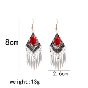Bohemian silver drop earrings with red stone and dimensions showing 8cm height