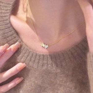 S925 silver 14K gold plated puzzle necklace with sparkling stones on a model