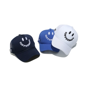 Three mesh trucker caps with COFFEEDAZE smiley face embroidery in blue and white