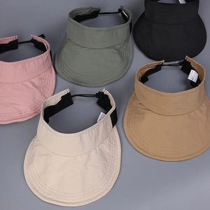 Flat lay of quick-dry sun visors in five colors with adjustable back drawstrings