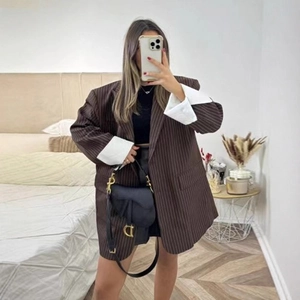 Oversized dark brown striped blazer for women with unique white folded cuffs