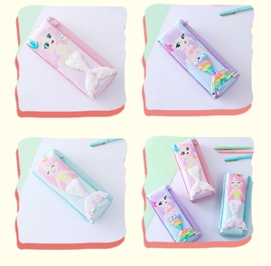 Detail of mermaid pencil cases featuring 3D colorful sequins tail and zipper closure