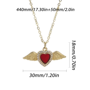 Detailed size chart of gold winged heart necklace with red stone and measurements