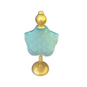 Blue fabric mannequin jewelry stand with gold grid pattern for necklace display