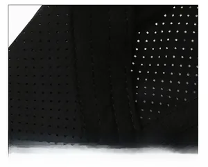 Detail of widened sweatband and breathable perforated fabric inside black sports cap