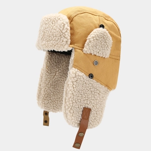 Colbacco da pilota giallo in tela con fodera in peluche bianco e paraorecchie invernali