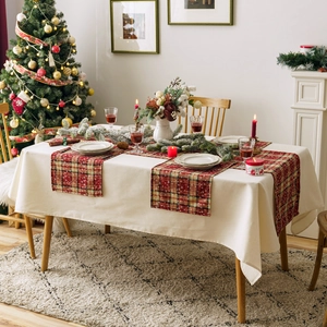 Christmas table runner and placemats set with festive red plaid and snowflake patterns