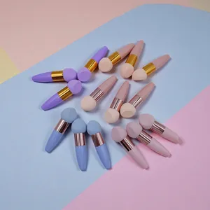 Three colorful mushroom head sponge makeup brushes with ergonomic handles for flawless blending