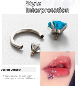 Detail of horseshoe lip ring with interchangeable blue, clear and pink heart zircon gems