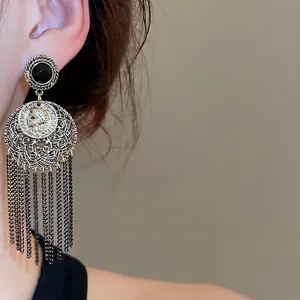 Vintage Baroque chain tassel earrings with portrait relief and hollow metal craftsmanship