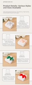 Detail view of square jewelry gift boxes with bows and sponge padding for rings