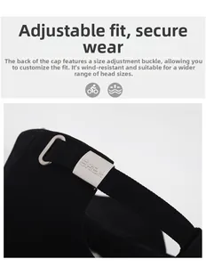Detail of adjustable metal buckle and twill fabric texture on black baseball cap