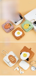 Mini faux leather pouch with cute fruit designs and D-ring for earbuds or keys