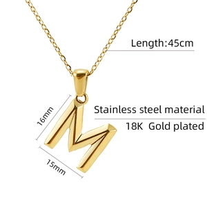 Detail of 18K gold plated letter M pendant with 45cm stainless steel chain