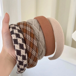 Retro wide-brimmed padded headbands for women in assorted knit patterns and solid colors