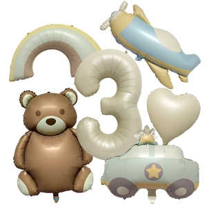 3rd birthday balloon set with brown bear, blue airplane, and cream number balloon