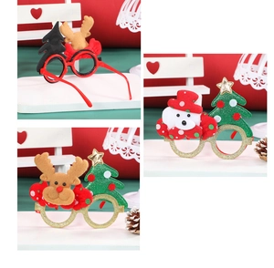Close-up of festive LED light-up Christmas glasses with reindeer and tree motifs