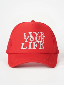 Detail of red trucker hat featuring white LIVE YOUR LIFE embroidery and mesh backing
