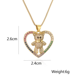 Detailed view of the 18K gold teddy bear pendant with rainbow zircons and dimensions