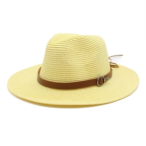 Detail of Panama fedora hat with fine straw weave and brown leather band detail