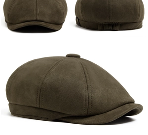 Detail van olijfgroene suède newsboy pet met naden en elastische band aan de achterkant
