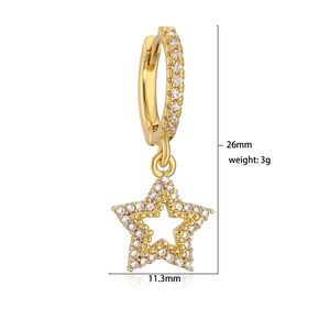 Gold star drop huggie earrings with cubic zirconia, 26mm height on white background