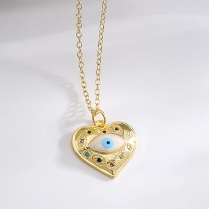 18K gold plated heart necklace featuring zircon encrusted evil eye and pearl details