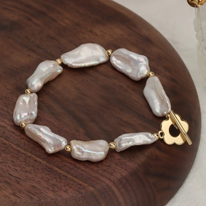 Baroque Freshwater Pearl Bracelet With Flower Toggle Clasp Gold Plated Irregular White Freshwater Pearl Elegant Jewelry For Women