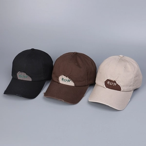 Distressed baseball caps with RUN embroidery in black, brown, and beige cotton canvas