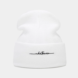 Minimalist white knit beanie with black whatever script embroidery for winter warmth
