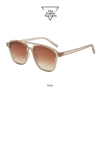 Side view of retro double bridge aviator sunglasses with tea frames and tinted lenses