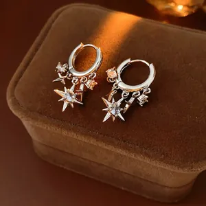 Sparkling star drop hoop earrings with zircon stones on premium velvet jewelry box