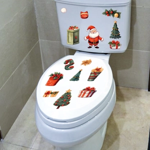 Christmas themed refrigerator and window stickers with Santa Claus and gift box patterns