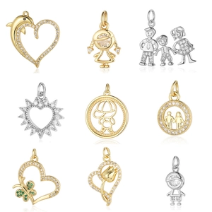 Selection of gold and silver plated copper pendants with butterfly and heart zircon motifs