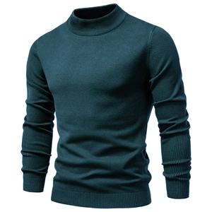 Close-up of high-quality dark teal fine knit texture on men's mock neck sweater