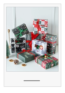 Detailed Christmas white kraft wrapping paper set with festive reindeer prints and ribbons
