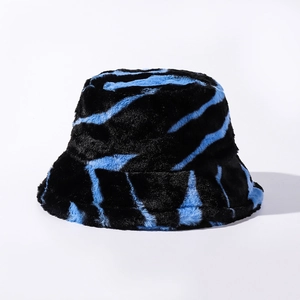 Detail of blue and black zebra stripe faux fur texture on a warm winter bucket hat
