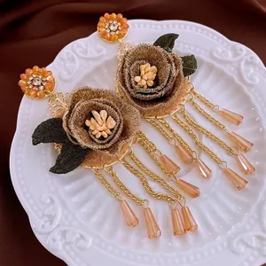 Boucles d'oreilles roses dorées vintage avec glands en cristal et perles d'ambre