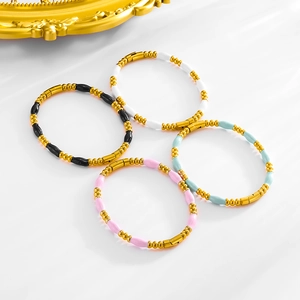 Minimalist stainless steel beaded bracelet with colorful enamel tubes in four vibrant colors