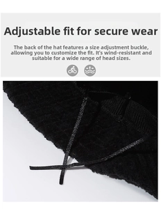 Close-up of the adjustable buckle on a black corduroy bucket hat for a perfect fit