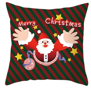 Detailed view of Santa Claus pillow cover with Merry Christmas text and star patterns