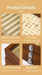 Detail of walnut wood jewelry box with velvet lining and anti-rust metal clasps