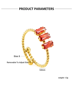 Detailed view of adjustable gold rope ring featuring three rectangular red zircon gemstones