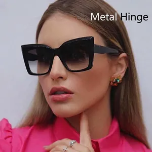 Women's vintage oversized cat-eye sunglasses with gradient lenses and metal hinges