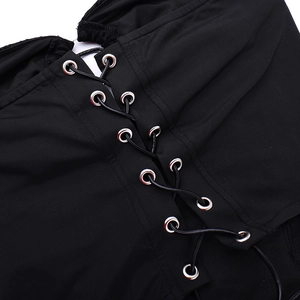 Détails du haut corset noir avec laçage croisé, œillets métalliques et texture de tissu